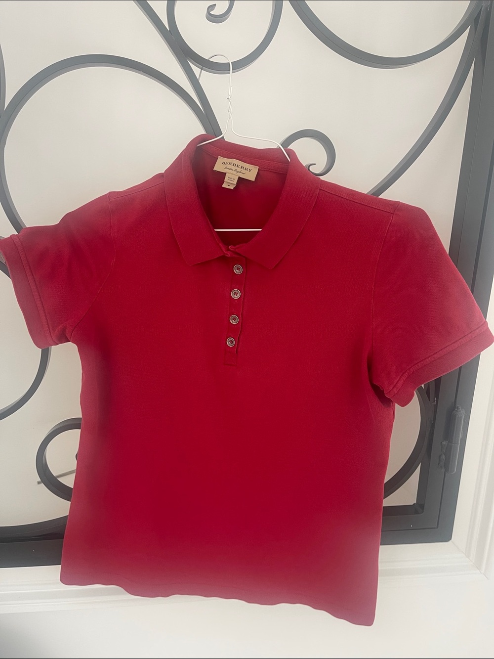 Burberry woman’s red cotton/poly short sleeve polo- size medium